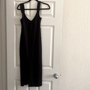 Black midi cotton dress. Size small. Never worn. Great condition.